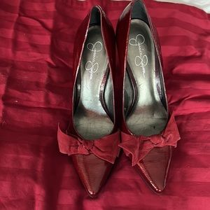 Red patent with bow high heel dressy shoe.